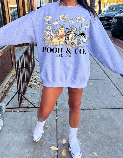 Pooh & Co. Cuddle Crewneck: A Hundred Acres of Warmth and Comfort!